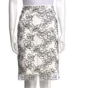 Reed Krakoff white pencil skirt with black floral overlay, size 6